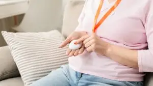 Cropped of Senior Woman Holding a Panic Button